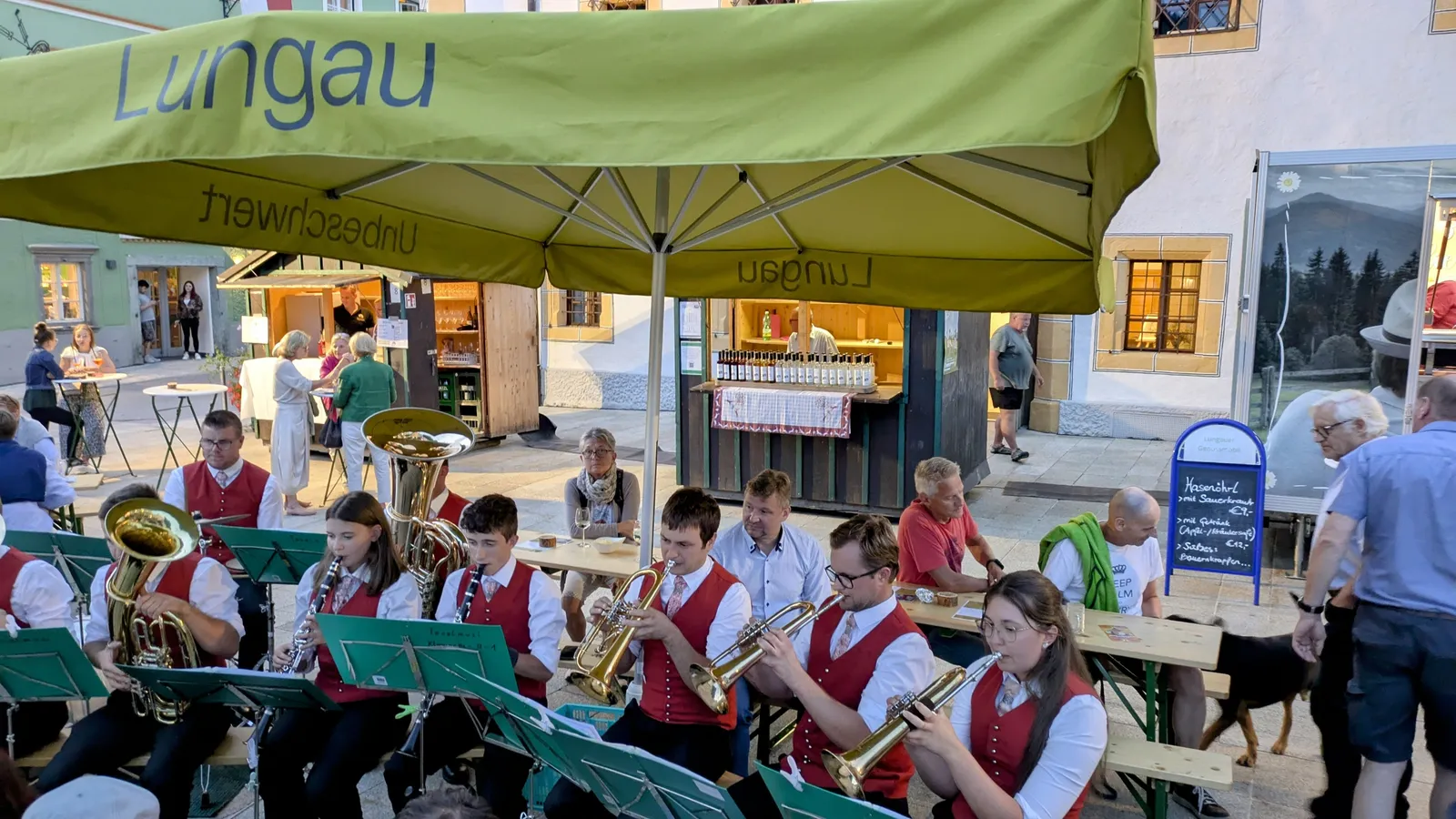 Traditional brass band performing under a Lungau canopy